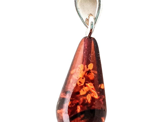 Bernsteintropfen 2 kurz dunkler Bernstein mit Einschlüssen