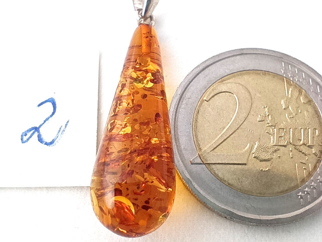 langer schmaler Bernsteintropfen Nr 2 mit 925 Silberöse an Korkkordel